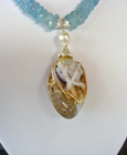 Fossilized Druzy Shell and Aquamarine Necklace…